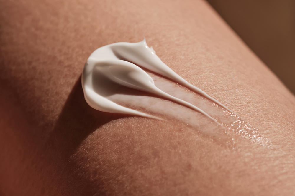 White body cream on human skin